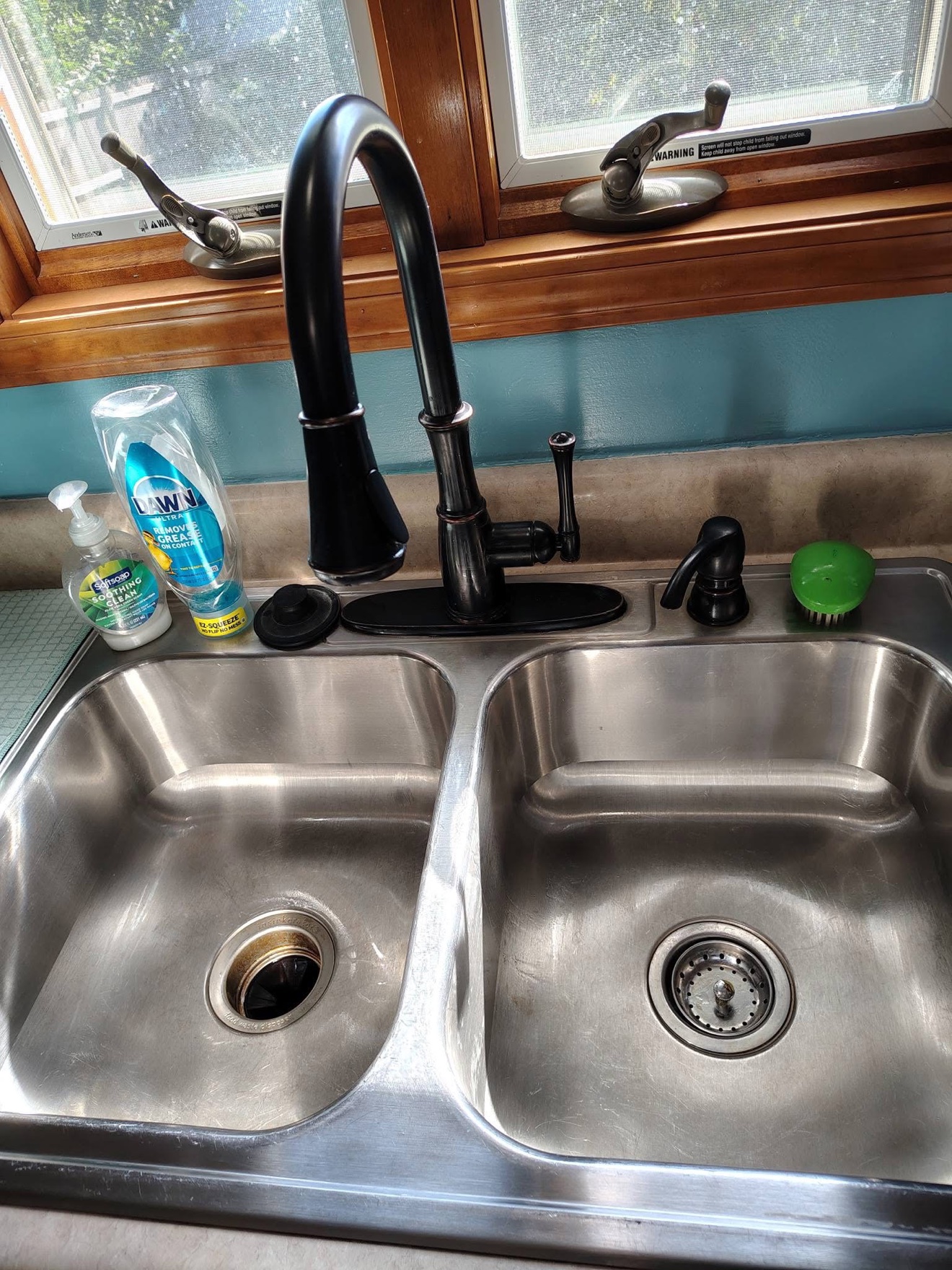 Same double kitchen sink bright after cleaning
