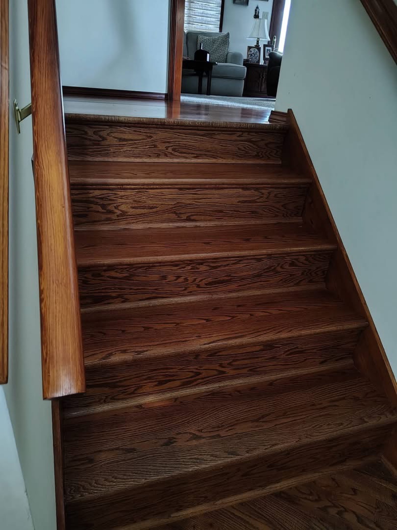 Same wooden staircase polished after cleaning