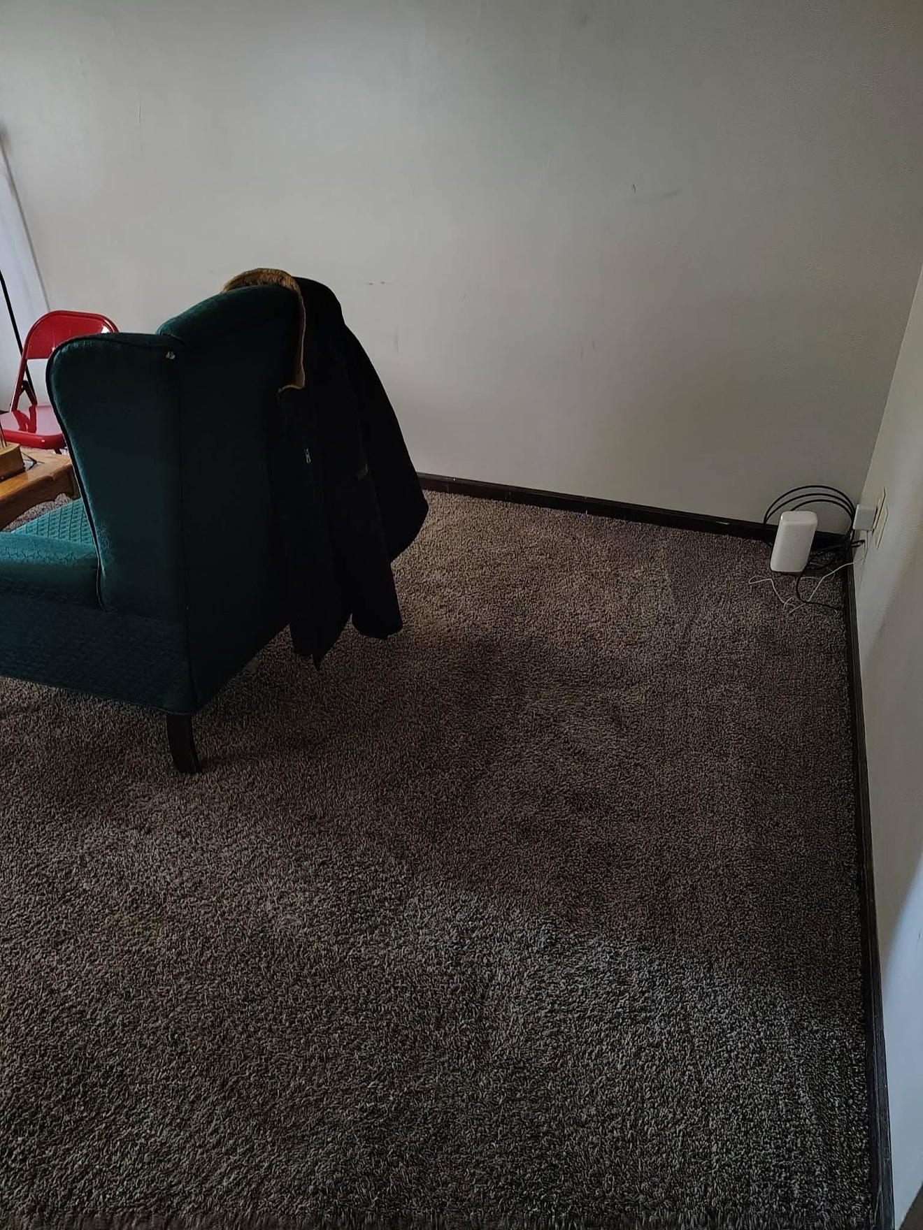 Same living-room corner clear after organization
